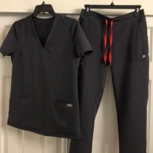 Limited Charcoal Color. Slightly used Top & bottom